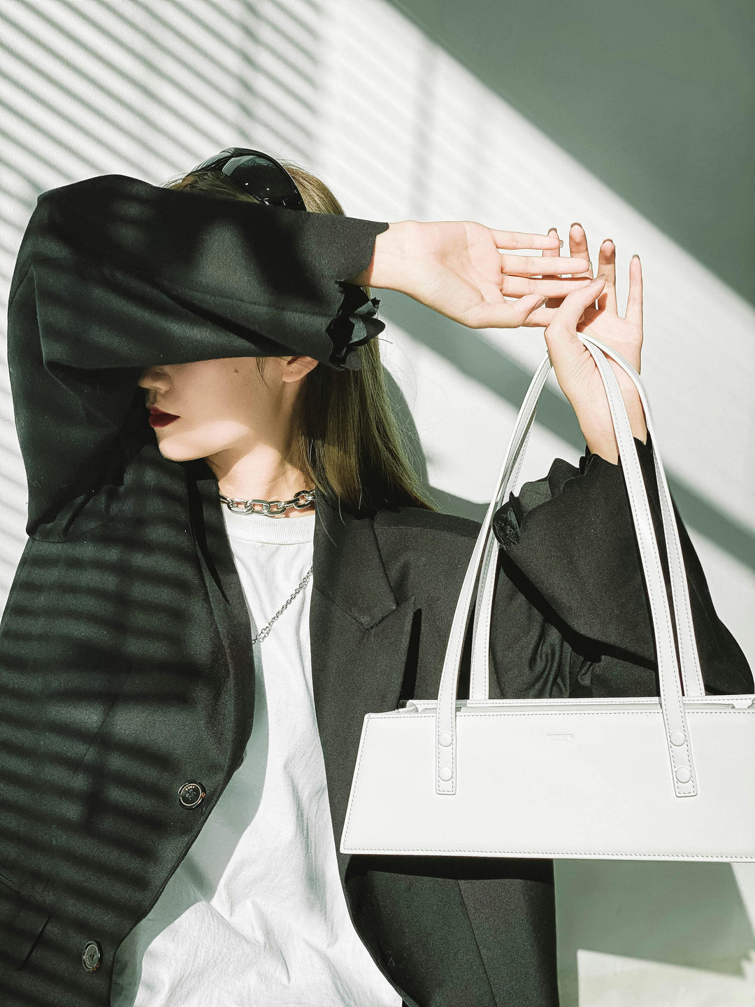 Black Blazer and White Bag
